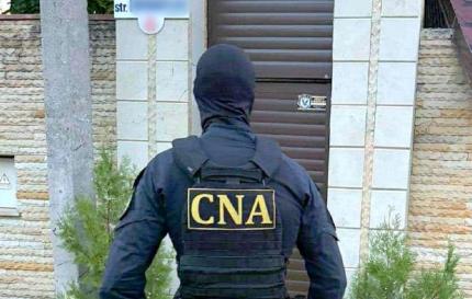 Percheziții pe întreg teritoriul țării: 10 persoane au fost reținute de CNA și procurori în dosare de corupere a alegătorilor, finanțare ilegală a partidelor politice și spălare a banilor